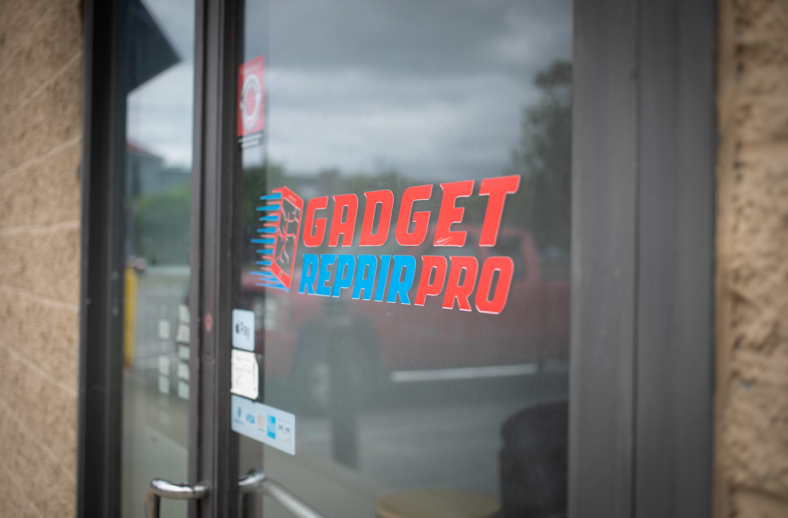 The Gadget Repair Pro shop door with the storefront logo.